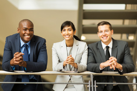 group of multiracial business people standing by stairwayの写真素材
