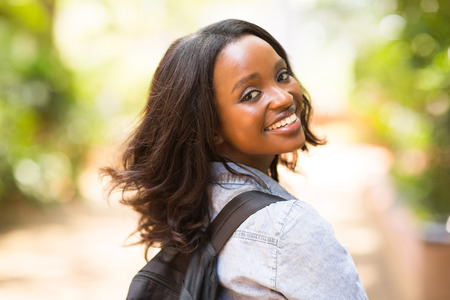 beautiful young african student going to schoolの写真素材