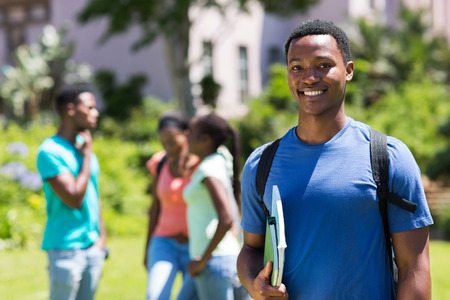 handsome african college student outdoorsの写真素材