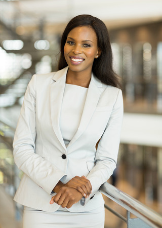 cheerful young afro american business womanの写真素材