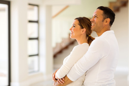 happy couple in new homeの写真素材