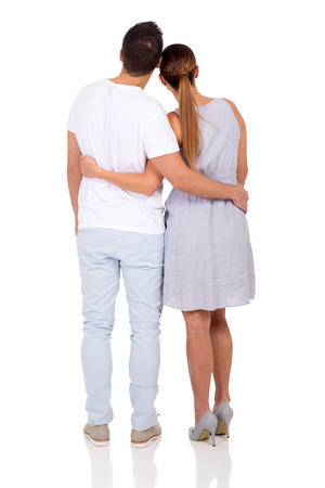 back view of young couple isolated on white backgroundの写真素材