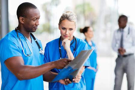 professional doctors studying x-ray filmの写真素材