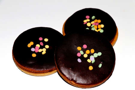 Christmas , Chocolate Linzer cookies on a white backgroundの写真素材