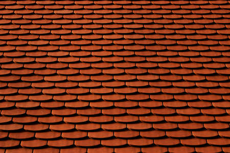 Orange roof tiles - European rounded roof-tilesの写真素材