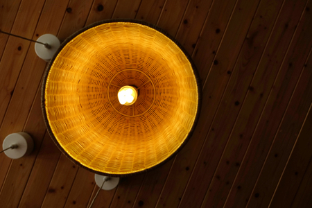 Lantern lamp hanging on the wooden ceilingの写真素材