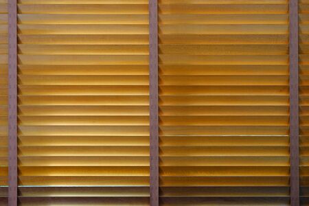 Closing wooden bamboo blind, front face and symmetryの写真素材