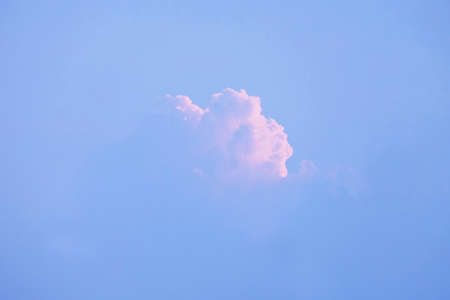 Single cloud with sunlight shade during sunset or sunrise