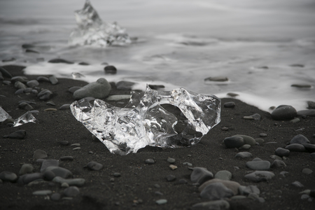Iceberg/Glacier pieces on Diamond beach near Jokulsarlon lagoon, Iceland