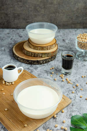 Kembang Tahu or Douhua  is a Chinese snack made with very soft tofu. kembang tahu is ginger drink...