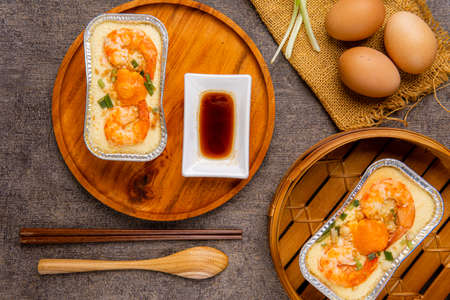 delicious steam egg with salted egg and shrimp.  Steam egg made by Eggs are beaten to a consistency...