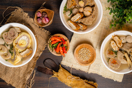 Bakso or baso is an Indonesian meatball, Its texture is similar to the Chinese beef ball, fish ball, or pork ball. The word bakso refer the complete dish of beef broth soup, noodle, tofu and bok choy.の写真素材