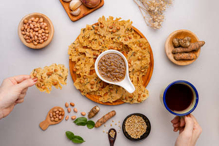 Rempeyek or peyek kacang is a deep-fried savoury Indonesian-Javanese cracker made from flour...