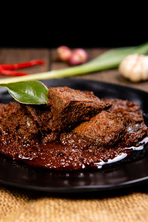 Beef Rendang is a Minang dish originating from the Minangkabau region in West Sumatra, Indonesia.  Rendang has been slow cooked and braised in a coconut milk seasoned with a herb and spice mixtureの写真素材