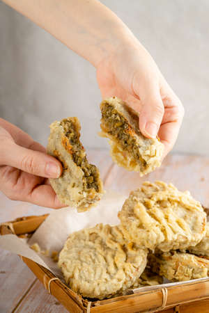 Gandasturi or kue kacang ijo. a cake from indonesia made from green beans and brown sugar, shaped...