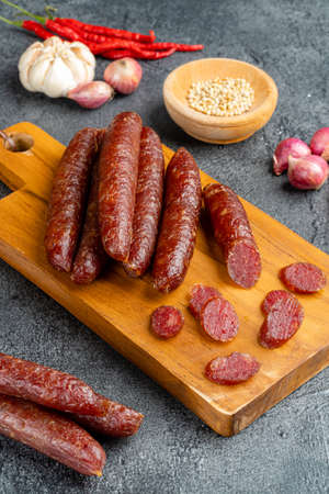 Lap cheong or chinese sausage are dried pork sausages that look and feel like pepperoni but are much sweeter. In southwestern China, sausages are flavored with salt, red pepper and wild pepper.の写真素材