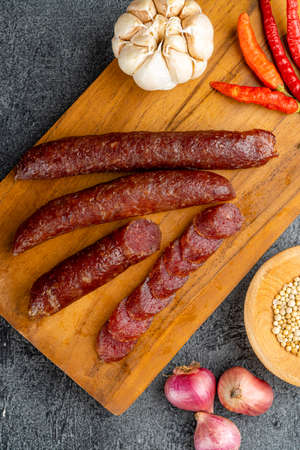 Lap cheong or chinese sausage are dried pork sausages that look and feel like pepperoni but are much sweeter. In southwestern China, sausages are flavored with salt, red pepper and wild pepper.の写真素材