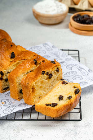 Chocolate Babka or Brioche Bread is prepared with a yeast-leavened dough that is rolled out and spread with a filling such as chocolate, fruit, or cheese, then rolled up and braided before baking.の写真素材