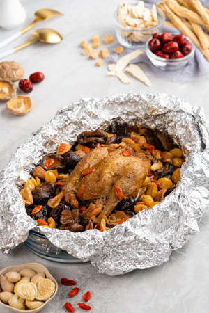 ingredients Stewed chicken soup  Chinese herbal medicine.  This soup very famous among chinese food and asian food as a healthy soup, food as medicine.の写真素材