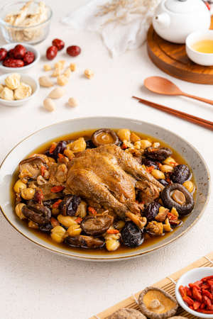 ingredients Stewed chicken soup  Chinese herbal medicine.  This soup very famous among chinese food and asian food as a healthy soup, food as medicine.の写真素材