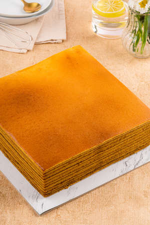 Bika ambon or golden cake or golden kuih bingka in Singapore, is an Indonesian dessert, made from ingredients such as tapioca flour, eggs, sugar, yeast and coconut milk.の写真素材