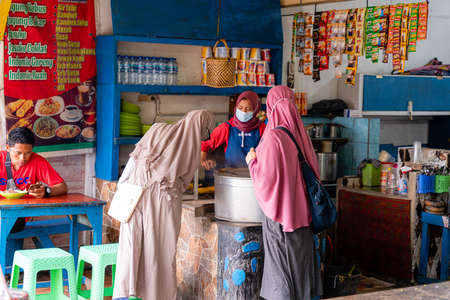 BERASTAGI, INDONESIA - SEPTEMBER 28,2021. Berastagi Fruit Market, North Sumatra a regionally famous traditional market selling local fruits souvenirs. Berastagi is famous for its passion fruit.のeditorial素材