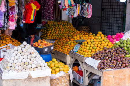 BERASTAGI, INDONESIA - SEPTEMBER 28,2021. Berastagi Fruit Market, North Sumatra a regionally famous traditional market selling local fruits souvenirs. Berastagi is famous for its passion fruit.のeditorial素材