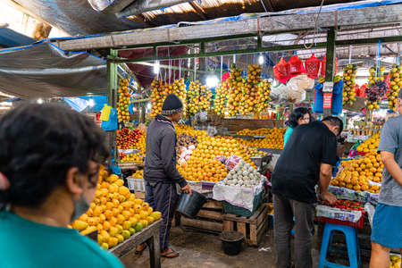 BERASTAGI, INDONESIA - SEPTEMBER 28,2021. Berastagi Fruit Market, North Sumatra a regionally famous traditional market selling local fruits souvenirs. Berastagi is famous for its passion fruit.のeditorial素材