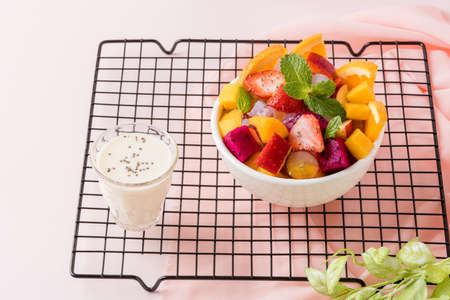 Fruit salad is a dish consisting of various kinds of fruit. fruit salad can be served as an appetizer, a side salad, or a dessert.の写真素材
