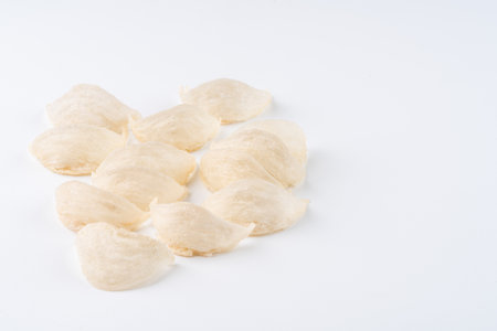 Top Grade edible bird nest shoot on white background with negative space. Raw edible bird's nest materials for tradition chinese medicine. Swallow nest the traditional chinese delicacy.の写真素材