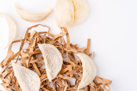 Top Grade edible bird nest shoot on white background with negative space. Raw edible bird's nest materials for tradition chinese medicine. Swallow nest the traditional chinese delicacy.の写真素材