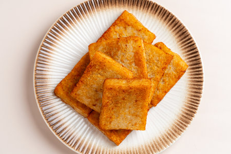 Turnip cake (Chinese : Chai tow kway ). Turnip cake  is a common dish or dim sum of Teochew cuisine in Chaoshan, China usually cut into rectangular slicesの写真素材