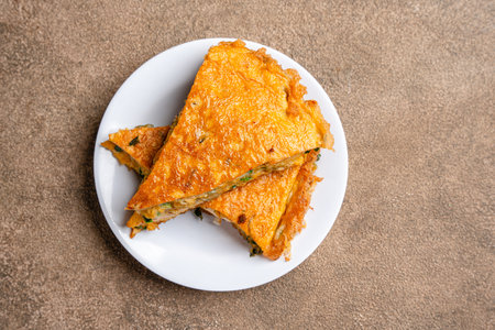 Padang Food - Fried Scrambled Eggs (Indonesian : Telur Dadar Padang) is a dish originating from West...