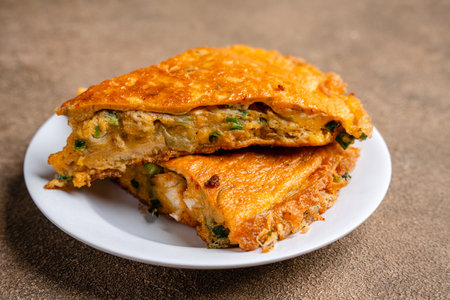 Padang Food - Fried Scrambled Eggs (Indonesian : Telur Dadar Padang) is a dish originating from West...