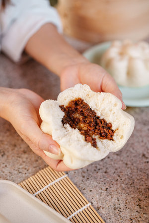 Baozi or Chinese Steamed Buns is a type of yeast-leavened filled bun in various Chinese cuisines.の写真素材