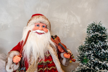 santa claus doll, santa claus statue with christmas decorations and gifts. christmas decorations for new year celebrationの写真素材