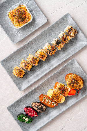 sushi is a Japanese dish of prepared vinegared rice, usually with some sugar and salt, accompanied...