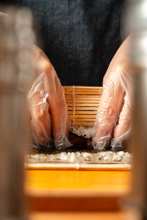 sushi is a Japanese dish of prepared vinegared rice, usually with some sugar and salt, accompanied by a variety of ingredients such as seafood, often raw and vegetables.の写真素材