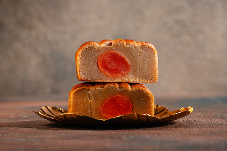 A mooncake  is a Chinese bakery product traditionally eaten during the Mid-Autumn Festival.