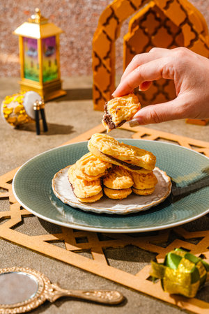 Kue lidah kucing with chocolate jam is a small Indonesian biscuit (kue kering) shaped somewhat like a cat's tongue (long and flat). They are sweet and crunchy.の写真素材