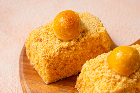 Nastar Cake is vanilla sponge based with crumbs, layered by pineapple jam and cheese cream. Topping with nastar cookies crumbsの写真素材