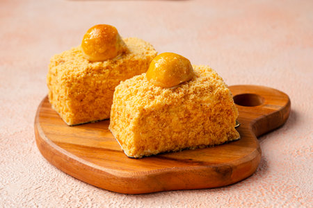 Nastar Cake is vanilla sponge based with crumbs, layered by pineapple jam and cheese cream. Topping with nastar cookies crumbsの写真素材