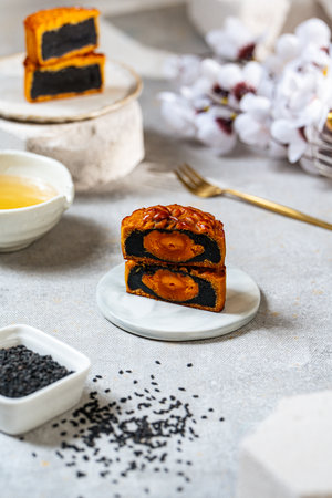 A mooncake is a Chinese bakery product traditionally eaten during the Mid-Autumn Festival.