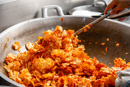 making process Emping Balado, Spicy Snacks from West Sumatra. Made from melinjo crackers, it's crunchy and sweet and spicy.の写真素材