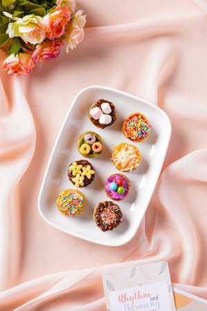 Martabak Mini Bangka with various Topping. The martabak mini bangka is made from a mixture of flour,...