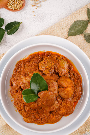 Rendang Jengkol, dogfruit simmered in spices and coconut milk. Indonesian traditional comfort food, with a spicy savory taste typical of rendang and a legit jengkol texture.の写真素材