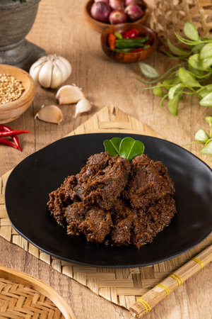 Beef Rendang is a Minang dish originating from the Minangkabau region in West Sumatra, Indonesia.  Rendang has been slow cooked and braised in a coconut milk seasoned with a herb and spice mixtureの写真素材