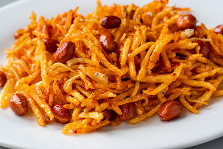 Sambal teri kentang is minang cuisine of West Sumatra, Indonesia. Served on white plateの写真素材