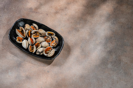 boiled blood clams anadara granosa seafood served with sweet and sour pineapple sauceの写真素材