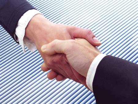 Conceptual photography of a business handshakeの写真素材